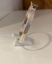 Load image into Gallery viewer, Sterling silver baby bangle with celtic design and black stone BB21S