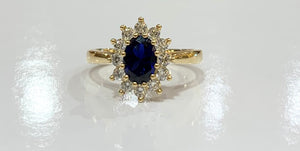 9ct yellow gold Sapphire and cubic zirconia cluster ring.