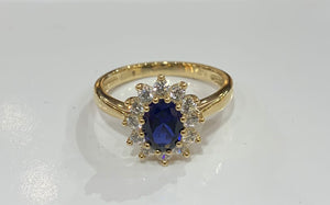 9ct yellow gold Sapphire and cubic zirconia cluster ring.