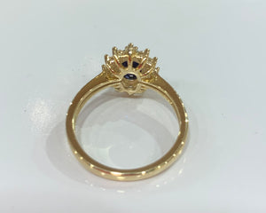 9ct yellow gold Sapphire and cubic zirconia cluster ring.