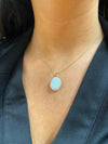 9ct gold Opel oval cubic zurconia surround pendant