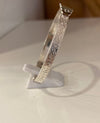 Sterling silver baby bangle with celtic design and black stone BB21S