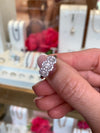 18ct white gold three stone Diamond oval Halo