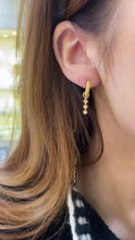 Load and play video in Gallery viewer, 24kae yellow gold three stone drop hoop earrings
