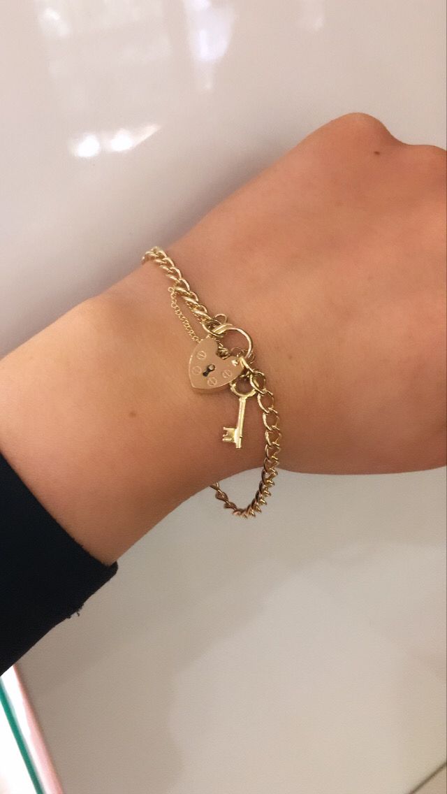 Solid 9ct yellow gold charm bracelet