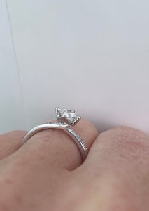 18CT WHITE GOLD PRINCESS CUT SOLITAIRE RING WITH DIAMOND SET SHOULDERS